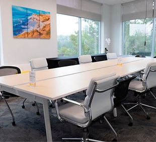 an image of a large classroom style table in the la jolla room in ignite sparked by bbb in san diego
