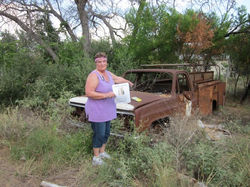 Pam points to where Kirby was found under truck