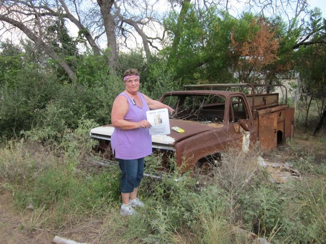 Pam points to where Kirby was found under truck