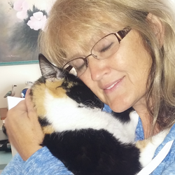 Deb and Patches reunion snuggle